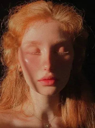 Red-haired portrait in warm sunlight